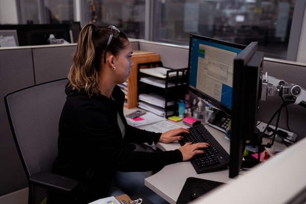 GRFT - woman working on a computer